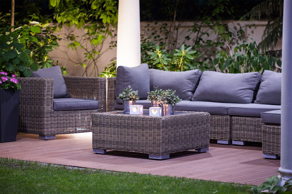 The backyard of a modern residential villa with wicker furniture