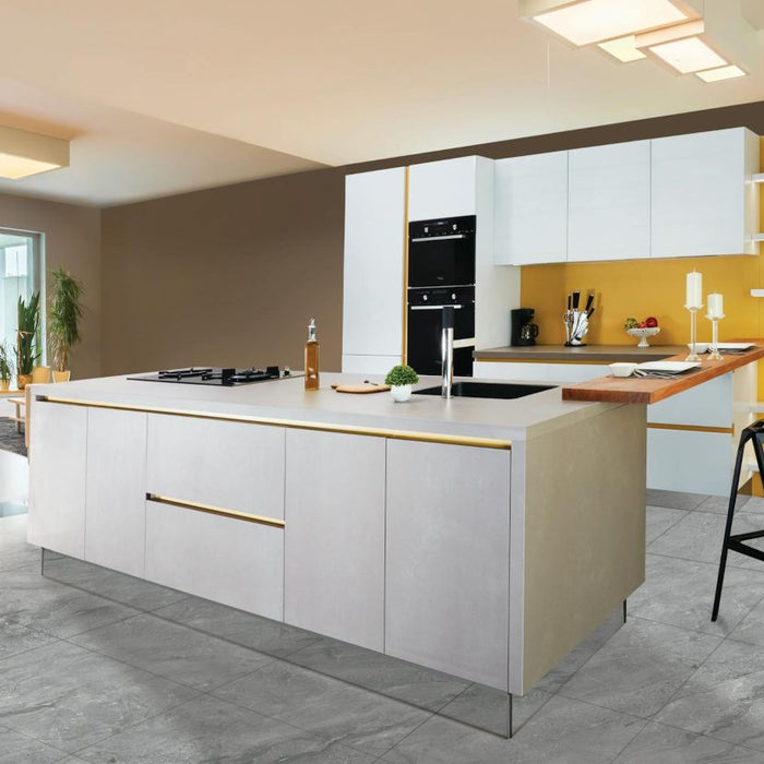 A modern white and gold-themed kitchen
