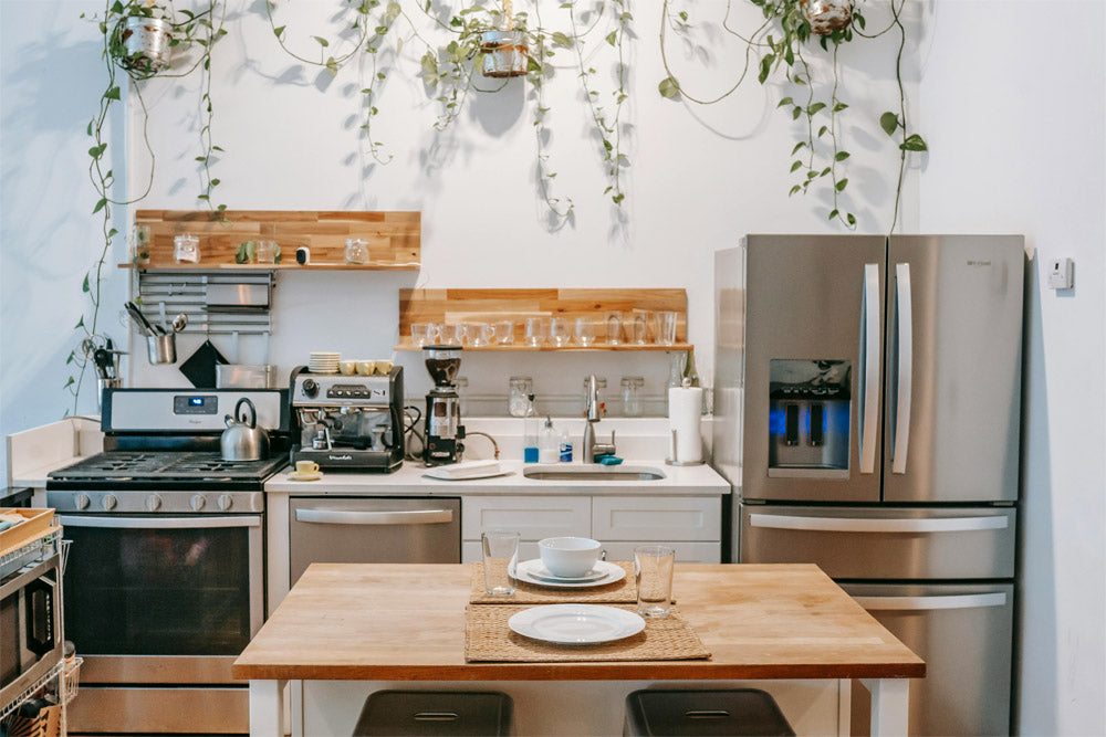 A compact kitchen with white walls